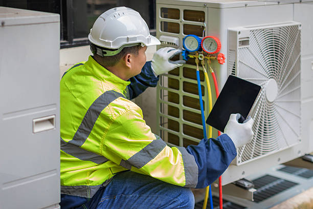 Professional Heat Pump Repair technician working in Millbury, MA